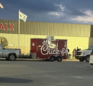 Chic Fil A food truck outside the church