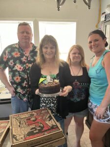 Leah, with Ray on his birthday, me, and her sister Heather at Heather's house